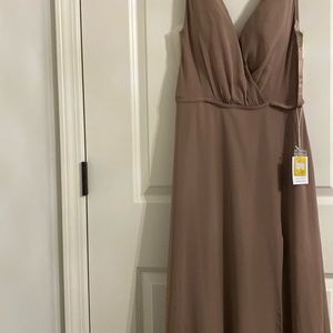 Beige dress with sheer on side and split